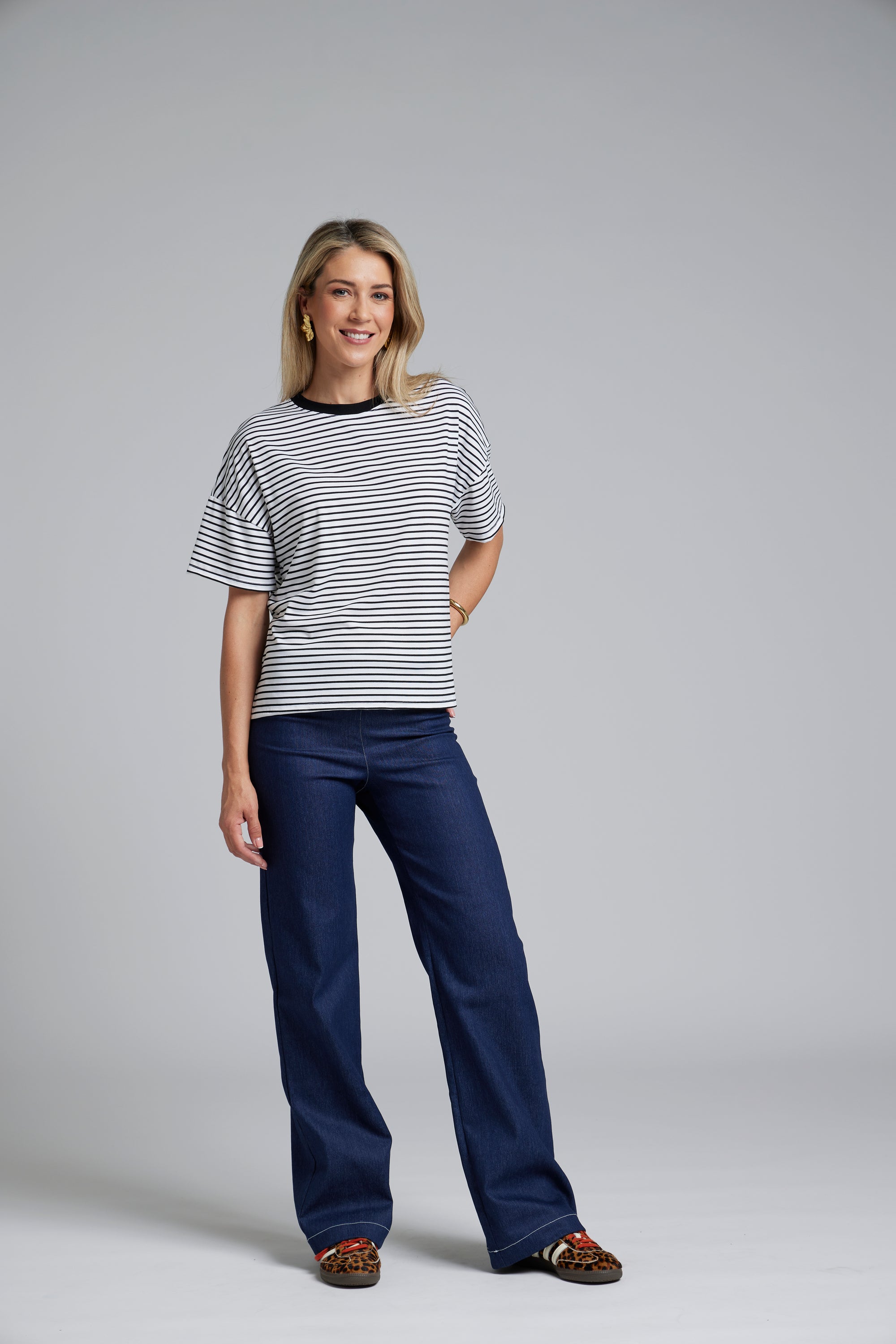 The N-E-S DollyB Denim Pants – a wide-leg stretch denim pant with fold-down rib waistband and contrast stitching. Available in blue or black denim. NZ made.