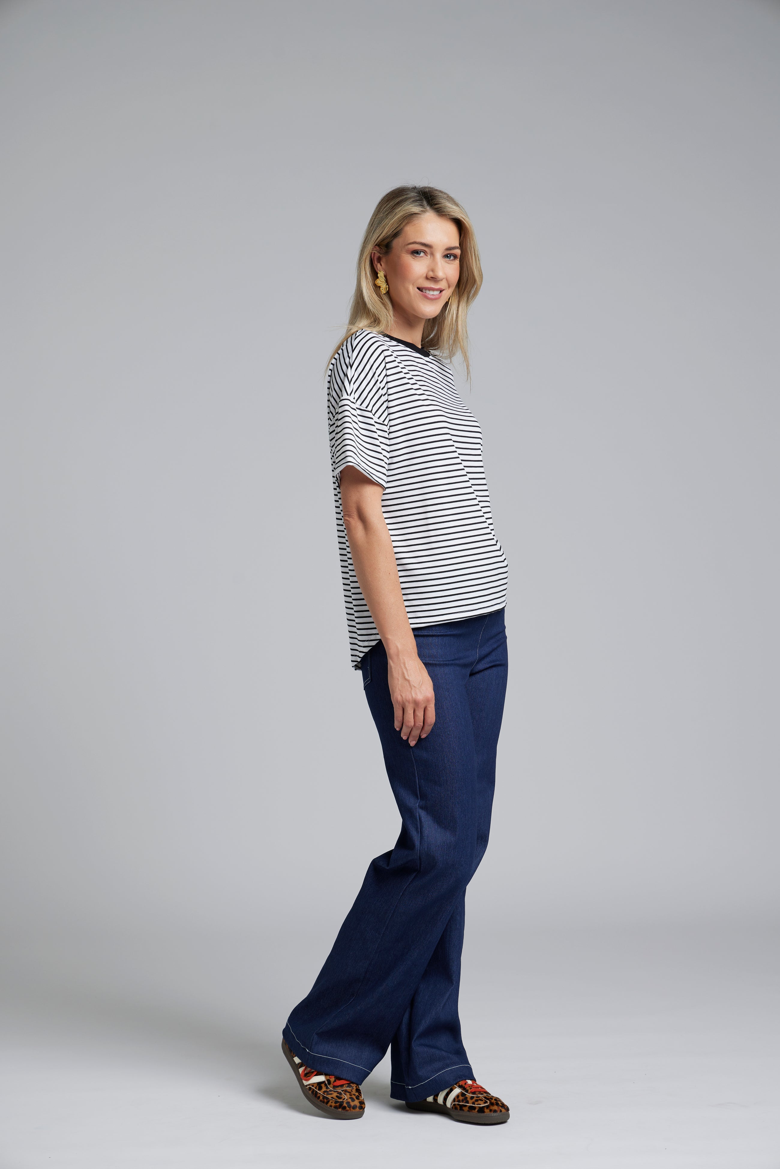 The N-E-S DollyB Denim Pants – a wide-leg stretch denim pant with fold-down rib waistband and contrast stitching. Available in blue or black denim. NZ made.