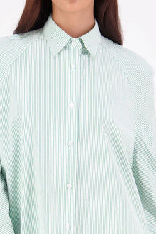 The NES Zola Shirt – an oversized seersucker shirt with kimono shape and drop-back detail. Lightweight, modern and NZ made.