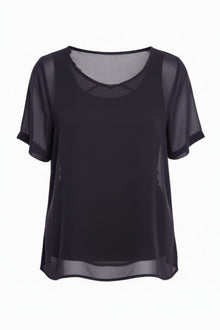 The N-E-S Charlie Top – a lightweight chiffon tee with relaxed fit, sheer layering and travel-friendly fabric. Designed and made in NZ.