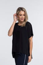 The NES Civita Top by N-E-S – a best-selling oversized chiffon top with split sides for versatile styling. Lightweight, effortless and NZ made.