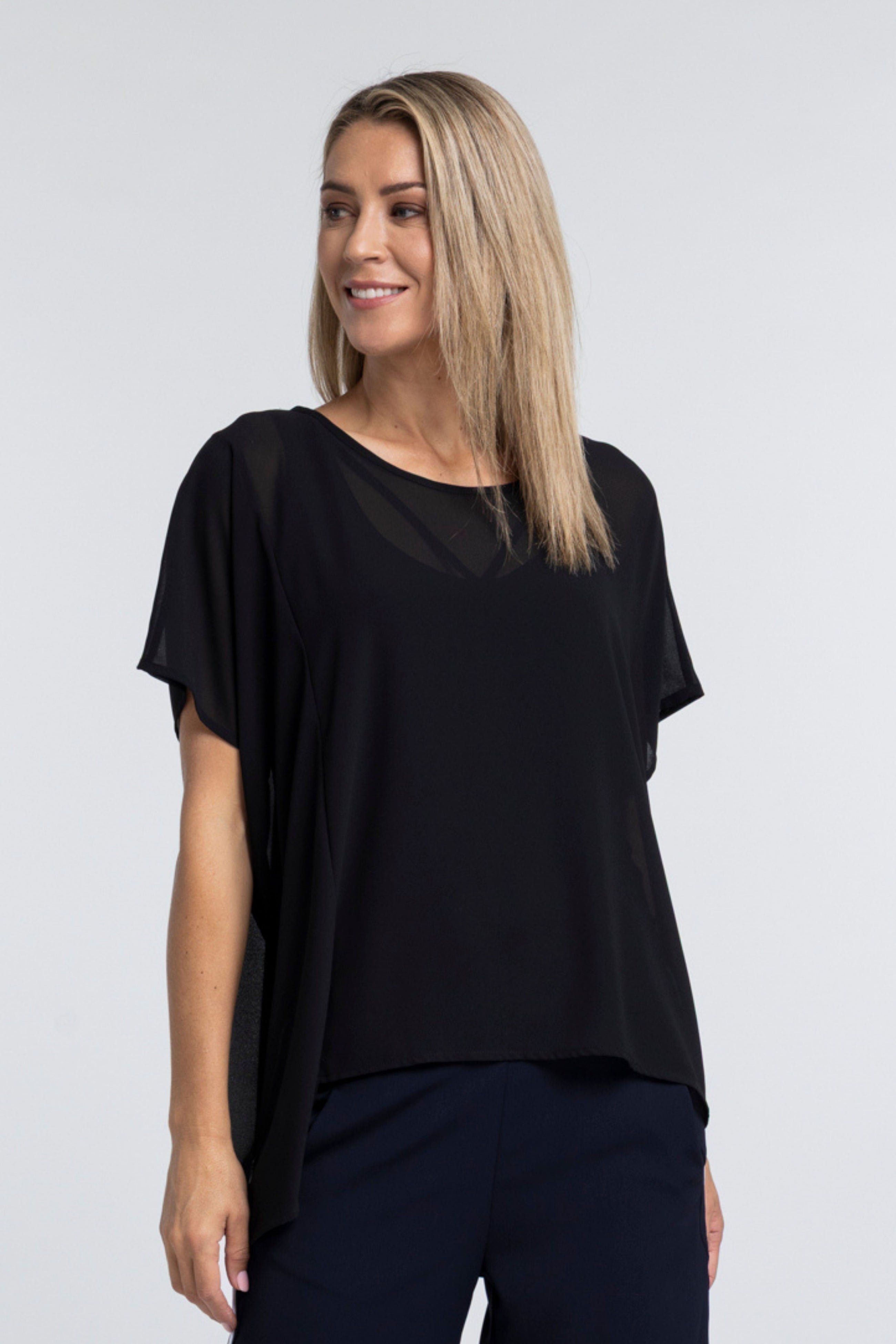 The NES Civita Top by N-E-S – a best-selling oversized chiffon top with split sides for versatile styling. Lightweight, effortless and NZ made.