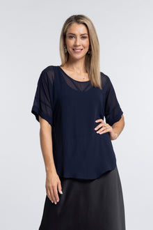 The NES Cross Top – a best-selling chiffon tee with crossover detail, relaxed fit and flattering drape. Lightweight and NZ made.
