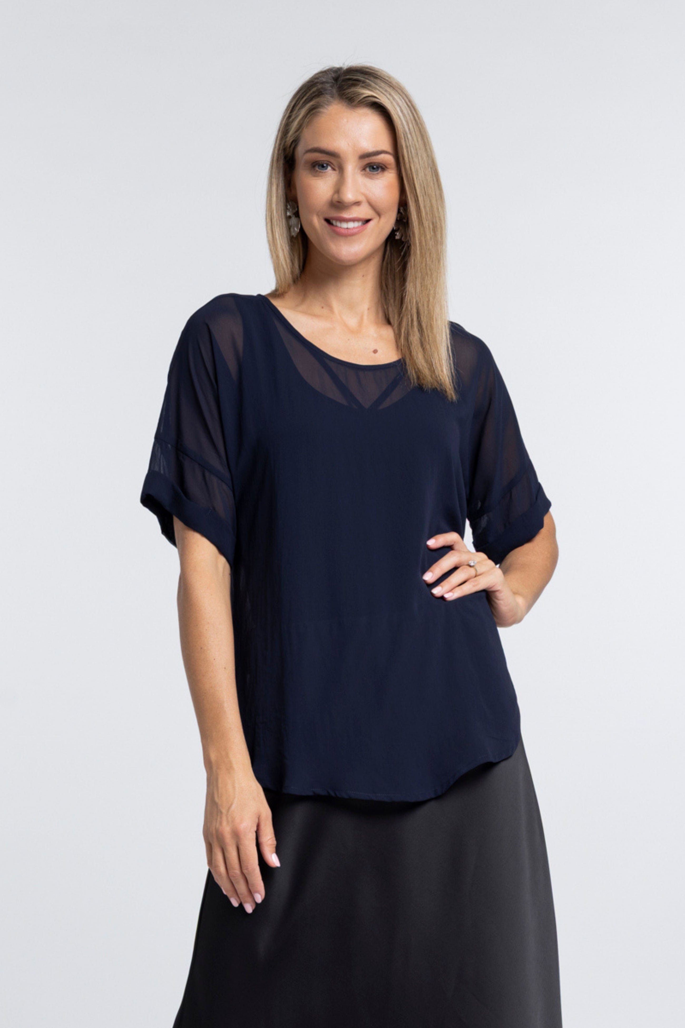 The NES Cross Top – a best-selling chiffon tee with crossover detail, relaxed fit and flattering drape. Lightweight and NZ made.