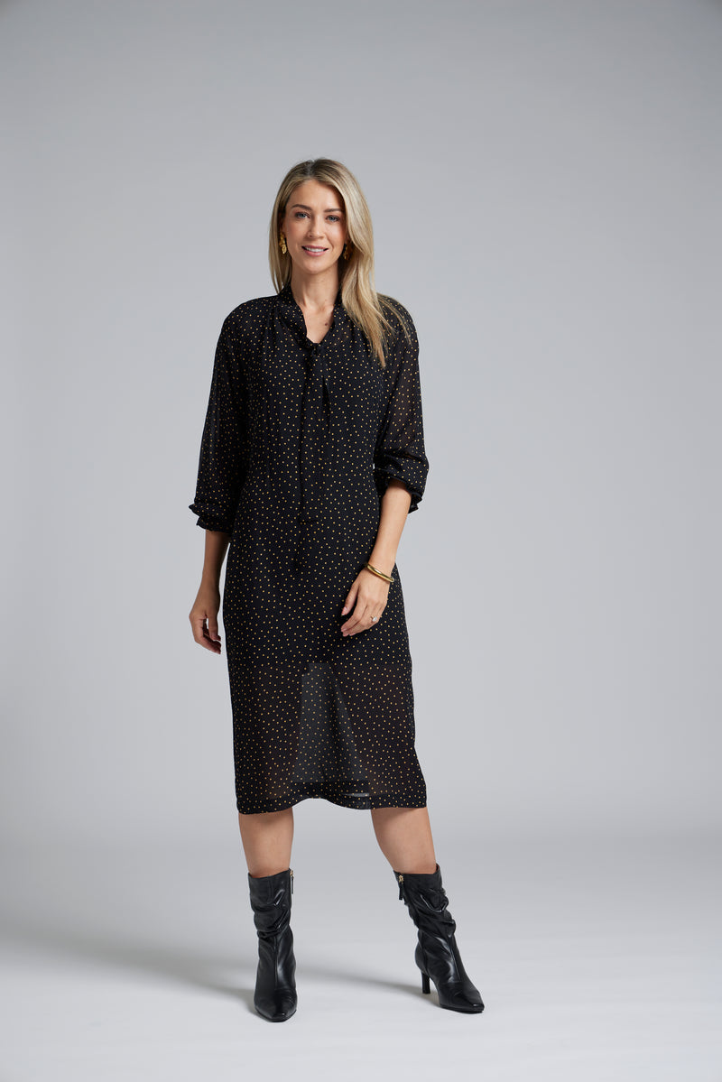 The NES Esme Dress by N-E-S - a soft viscose georgette dress with raglan sleeves, waist tie and subtle polka dot print. Mid calf and NZ made.