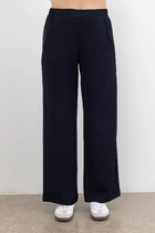 The NES Gin Pants by N-E-S – a best-selling classic with a flattering fit, flat front, elastic back and new piping detail. Breathable, timeless and NZ made.