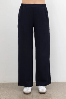 The NES Gin Pants by N-E-S – a best-selling classic with a flattering fit, flat front, elastic back and new piping detail. Breathable, timeless and NZ made.