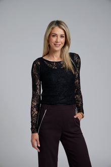 The NES Base Layer Top by N-E-S – a sheer abstract lace long sleeve with raw hems and crew neck. Perfect layered under tees, shirts or worn alone. NZ made.