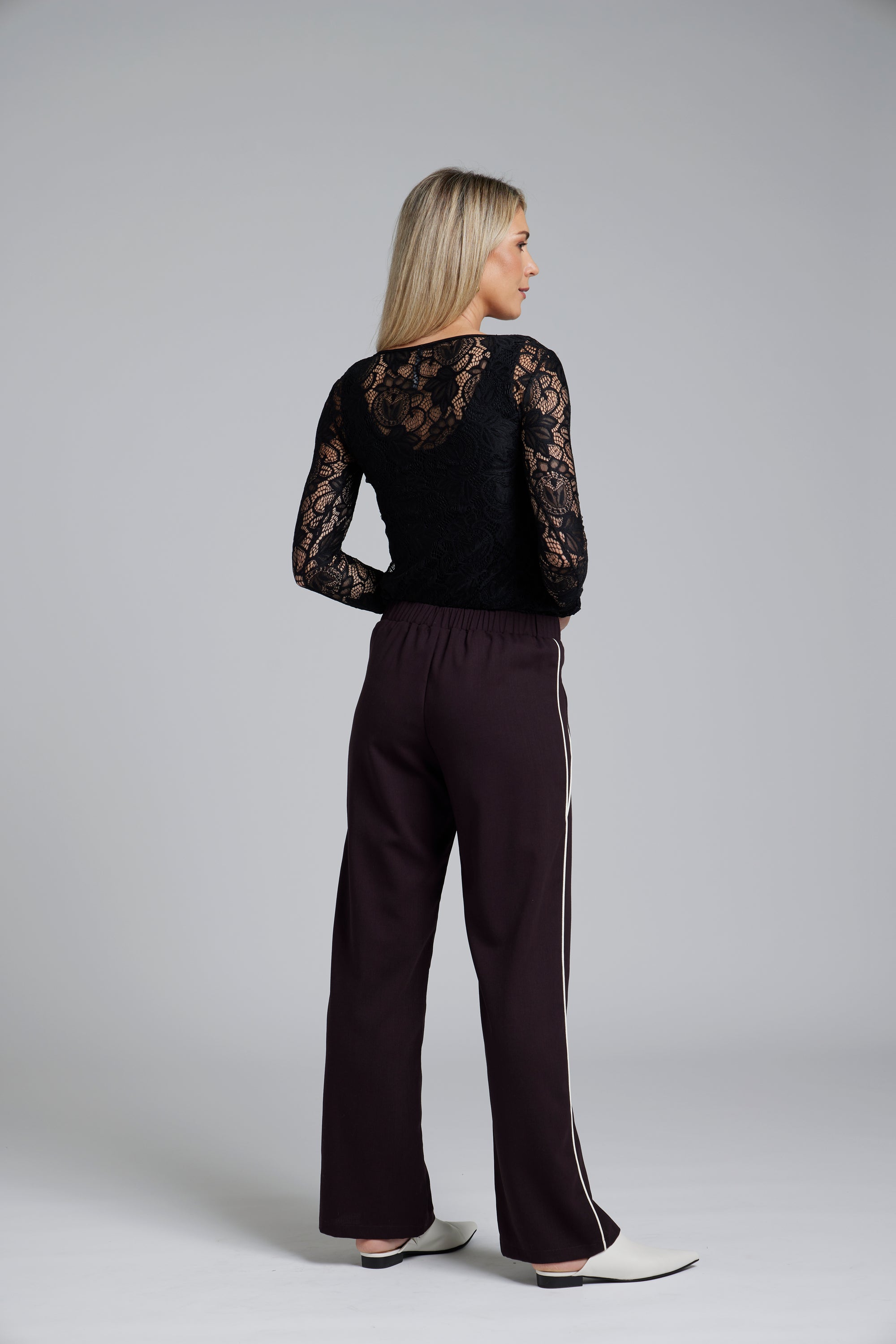 The NES Base Layer Top by N-E-S – a sheer abstract lace long sleeve with raw hems and crew neck. Perfect layered under tees, shirts or worn alone. NZ made.