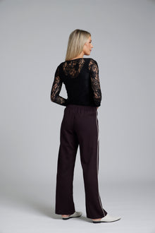 The NES Base Layer Top by N-E-S – a sheer abstract lace long sleeve with raw hems and crew neck. Perfect layered under tees, shirts or worn alone. NZ made.