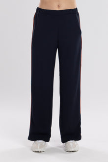 The NES Piped Gin Pants – a best-selling fit with elastic waist, side piping and 32" length. Comfortable, polished and designed for everyday wear.