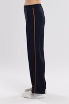The NES Piped Gin Pants – a best-selling fit with elastic waist, side piping and 32" length. Comfortable, polished and designed for everyday wear.