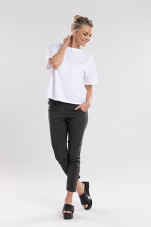 NES Section Pant is the perfect blend of style and comfort, featuring fabulous spliced detailing that adds a modern edge to your look. With a sleek flat front and an elasticated back, these pants offer a comfortable and flattering fit. Practical side pockets enhance the design, while the length finishes just above the ankle, creating a chic, tailored silhouette. Ideal for both casual and dressier occasions