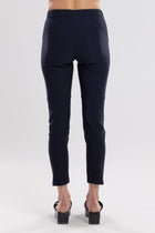 NES Section Pant is the perfect blend of style and comfort, featuring fabulous spliced detailing that adds a modern edge to your look. With a sleek flat front and an elasticated back, these pants offer a comfortable and flattering fit. Practical side pockets enhance the design, while the length finishes just above the ankle, creating a chic, tailored silhouette. Ideal for both casual and dressier occasions