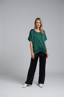 The NES Gin Satin Pant – a straight leg hammered satin pant with flat front, elastic back and fluid drape. Available in Black and Ink. NZ made.