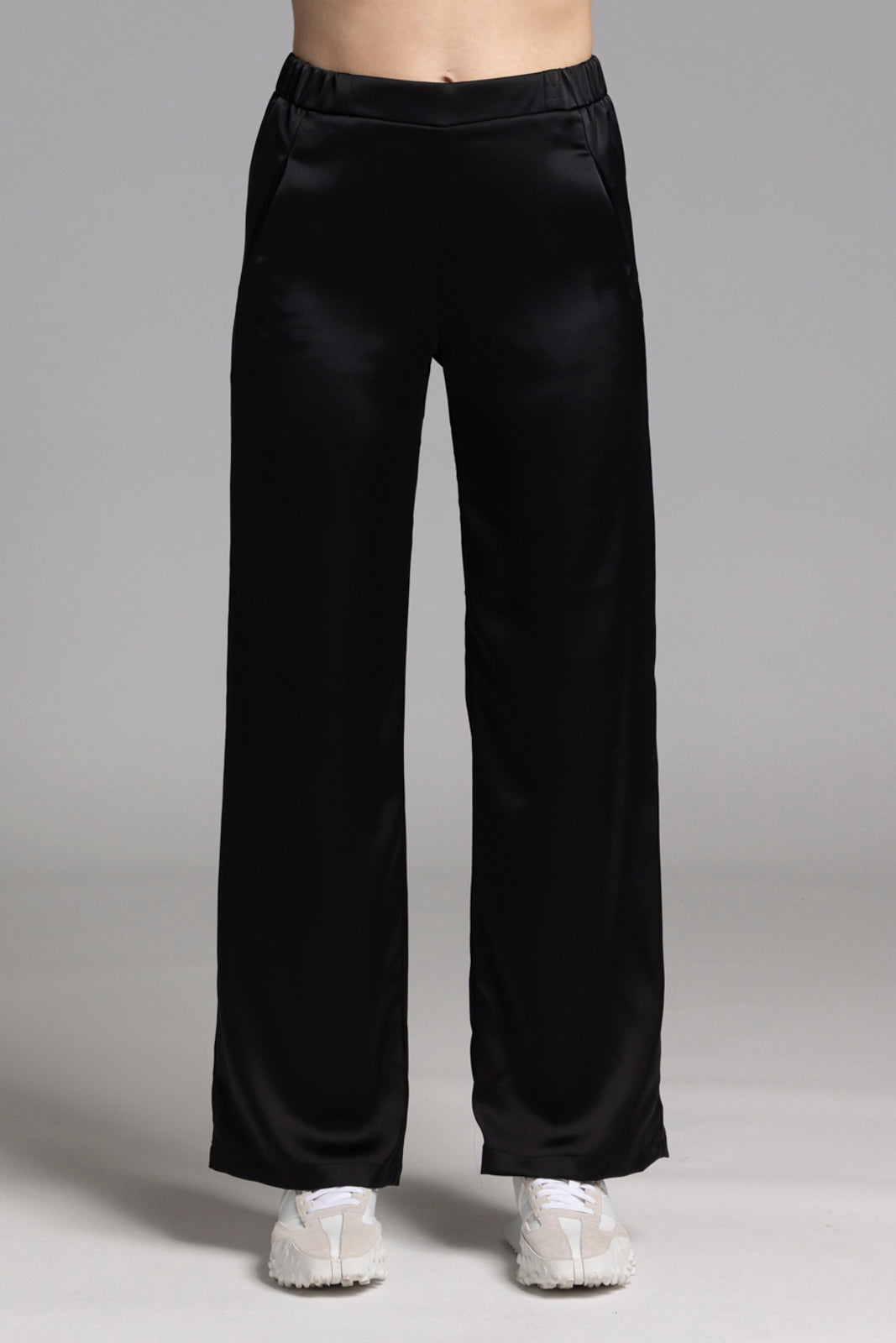 The NES Gin Satin Pant – a straight leg hammered satin pant with flat front, elastic back and fluid drape. Available in Black and Ink. NZ made.