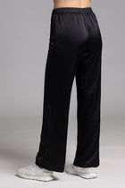 The NES Gin Satin Pant – a straight leg hammered satin pant with flat front, elastic back and fluid drape. Available in Black and Ink. NZ made.