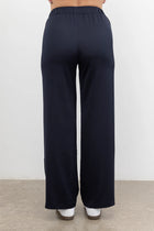 The NES Gin Satin Pant – a straight leg hammered satin pant with flat front, elastic back and fluid drape. Available in Black and Ink. NZ made.