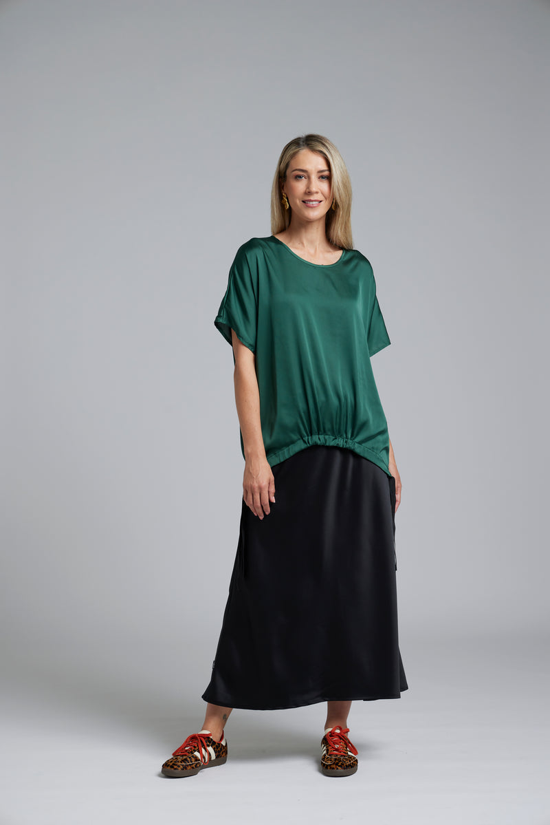 The NES Vanotti Tunic by N-E-S. A floaty scoop-neck tunic in viscose georgette or satin. Wear loose or drawn in. Sizes XS/S, SM, ML. NZ made.