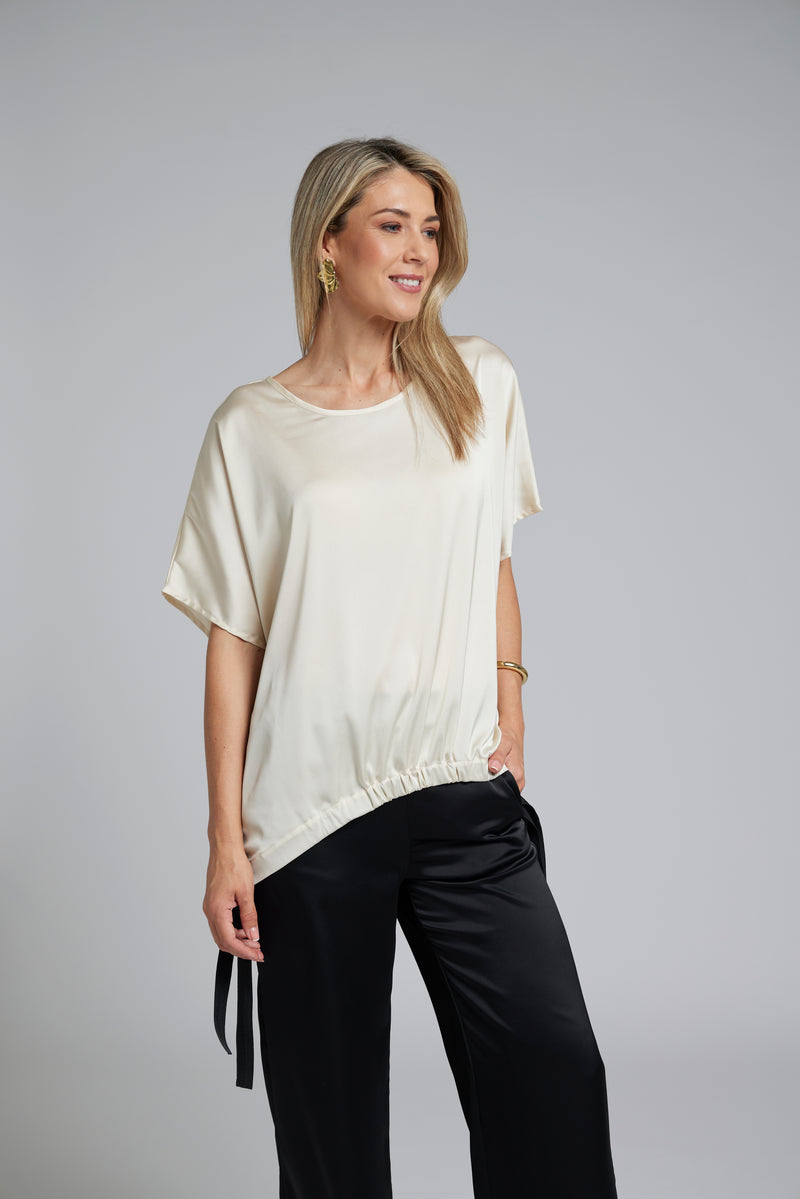The NES Vanotti Tunic by N-E-S. A floaty scoop-neck tunic in viscose georgette or satin. Wear loose or drawn in. Sizes XS/S, SM, ML. NZ made.