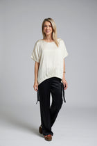 The NES Vanotti Tunic by N-E-S. A floaty scoop-neck tunic in viscose georgette or satin. Wear loose or drawn in. Sizes XS/S, SM, ML. NZ made.