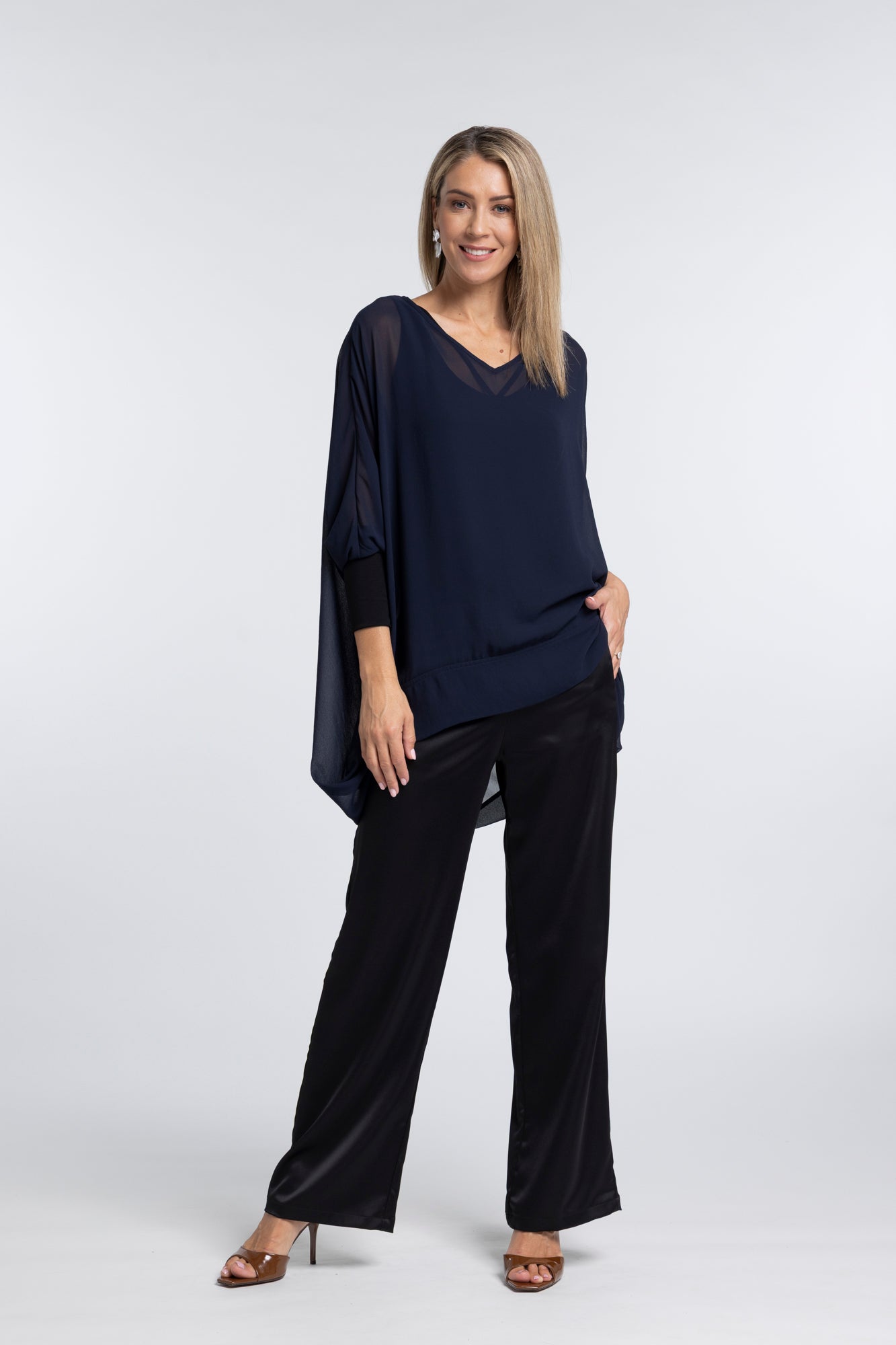 The NES Virtue Tunic – a floaty, relaxed tunic with a scoop neck, curved hem and effortless drape. Perfect layered over a Lattice Singlet. NZ made.