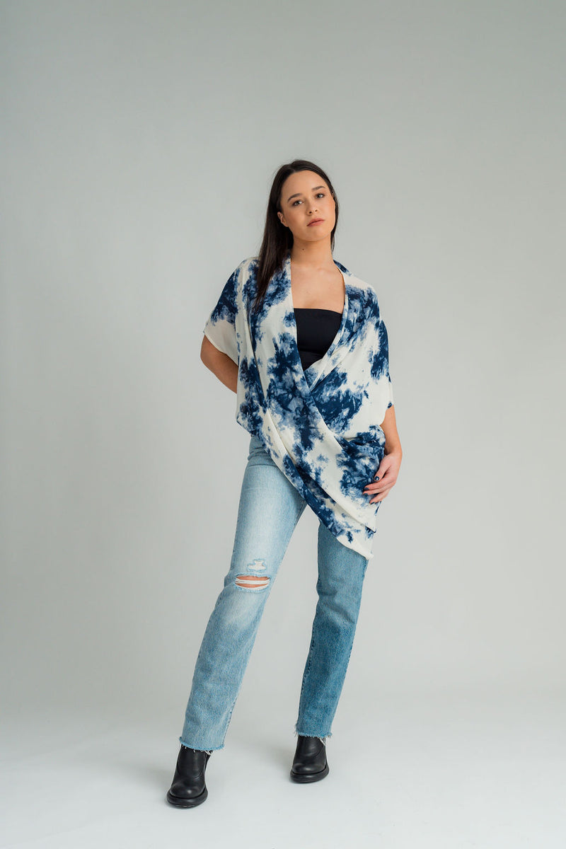 The NES Adele Tunic is a favourite piece that effortlessly transitions from casual to dressy. Pair it with your favourite pants, jeans, or our NES Rib Skirt for a chic look. Featuring a modern twist crossover, this tunic can be worn at the front or back, or flipped upside down for a unique twist where the long back drapes around your shoulders and front neck. Made from breathable viscose georgette, it’s comfortable and light