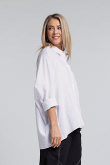The NES Zola Linen Shirt – an oversized linen-cotton shirt with contrast stitching and drop-back detail. Lightweight and NZ made.
