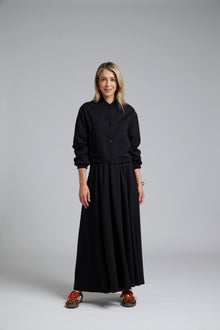 The NES Zadie Skirt by N-E-S – a full length ponte skirt with outward pleats, elastic back insert and clean modern fit. NZ made in Black or Latte.