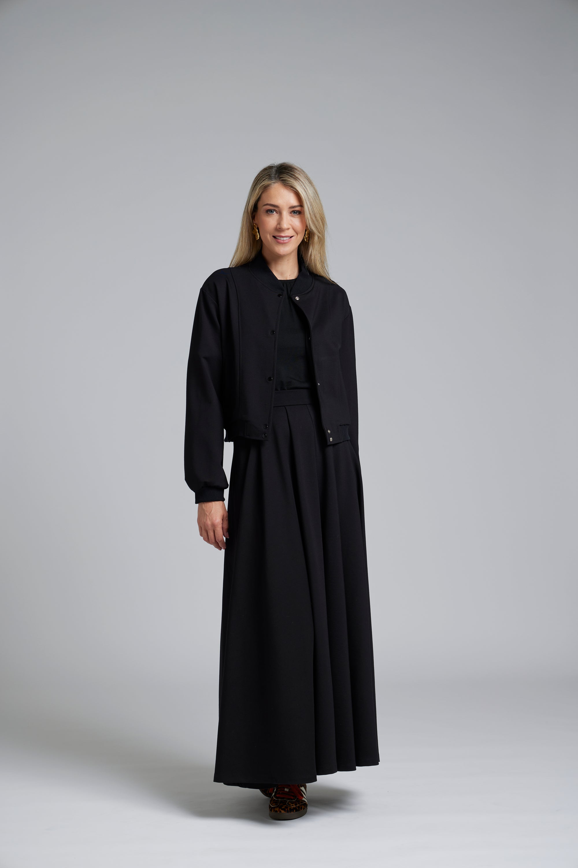 The NES Zadie Skirt by N-E-S – a full length ponte skirt with outward pleats, elastic back insert and clean modern fit. NZ made in Black or Latte.