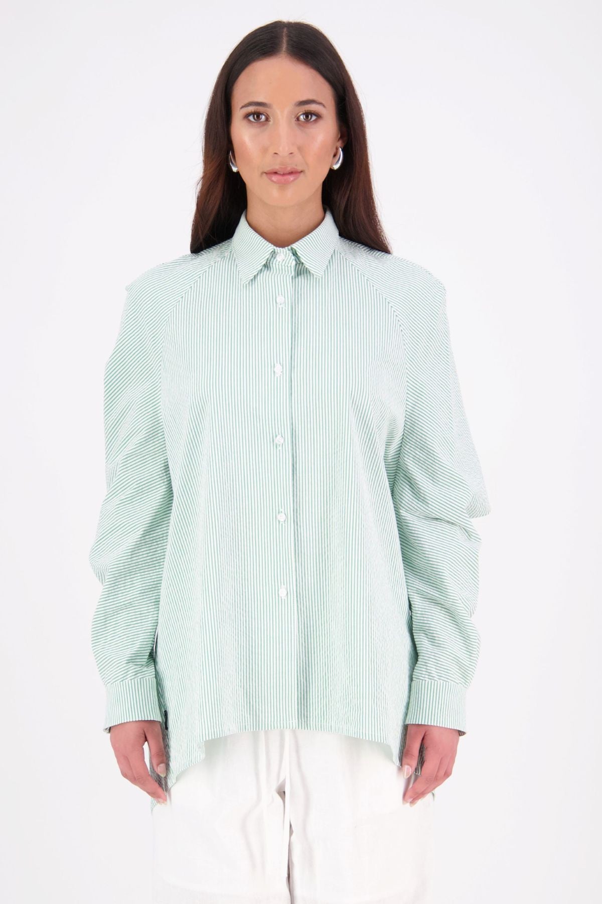 The NES Zola Shirt – an oversized seersucker shirt with kimono shape and drop-back detail. Lightweight, modern and NZ made.