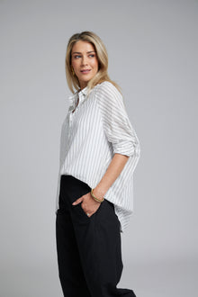 The NES Zola Shirt – an oversized cotton stripe shirt with kimono shape and drop-back detail. Lightweight, modern and NZ made.