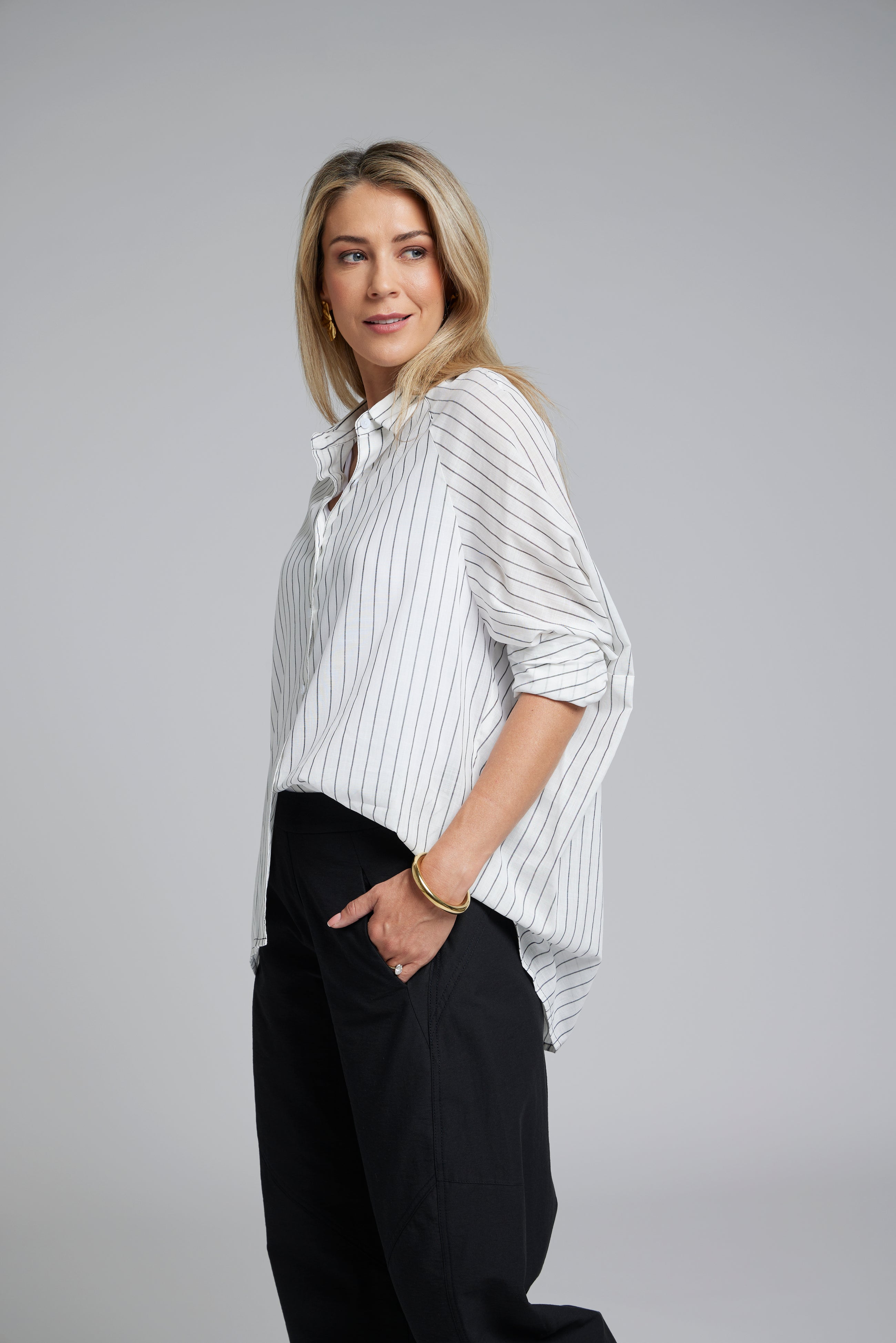 The NES Zola Shirt – an oversized cotton stripe shirt with kimono shape and drop-back detail. Lightweight, modern and NZ made.