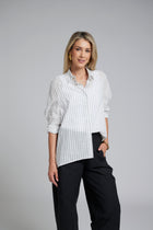The NES Zola Shirt – an oversized cotton stripe shirt with kimono shape and drop-back detail. Lightweight, modern and NZ made.