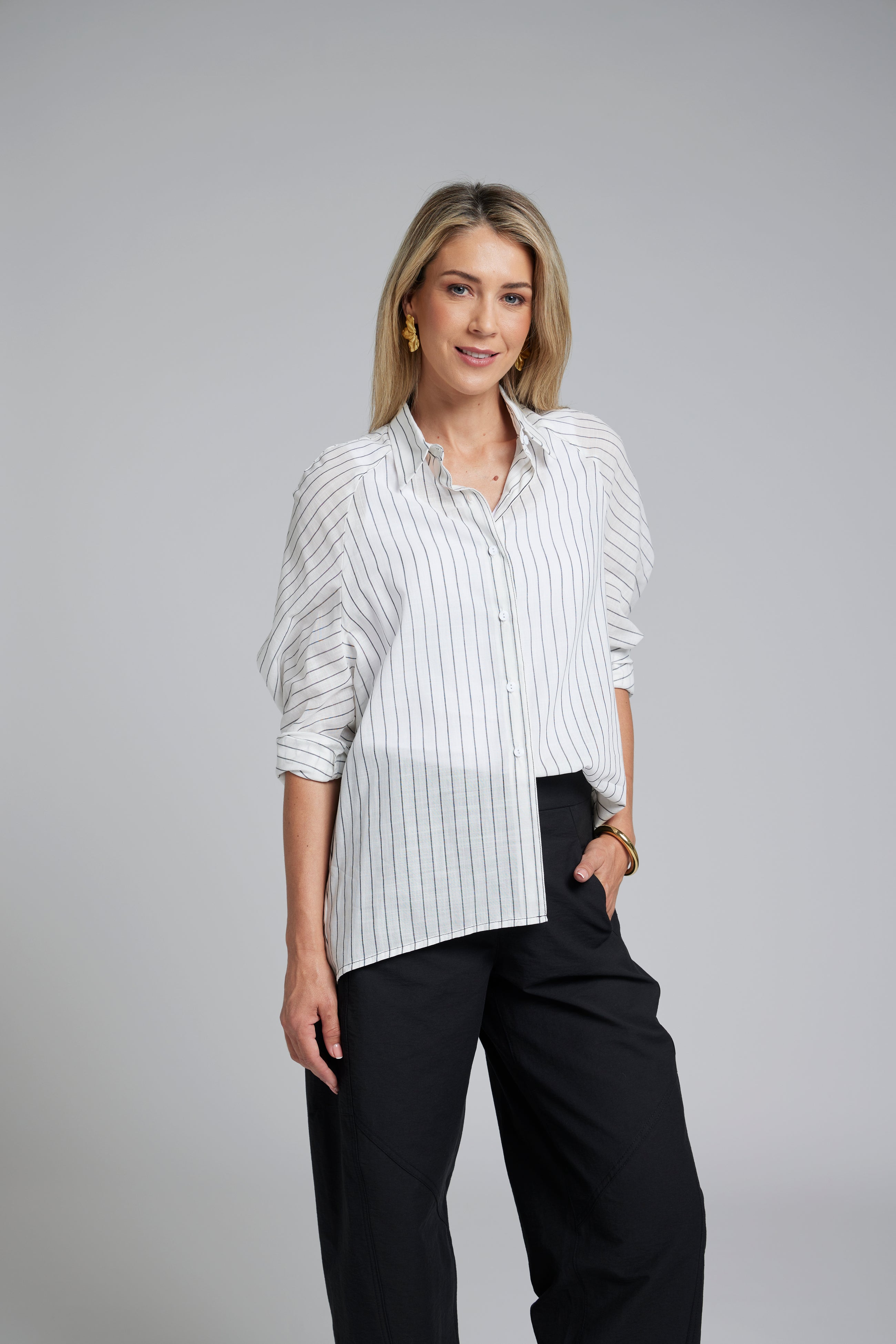 The NES Zola Shirt – an oversized cotton stripe shirt with kimono shape and drop-back detail. Lightweight, modern and NZ made.