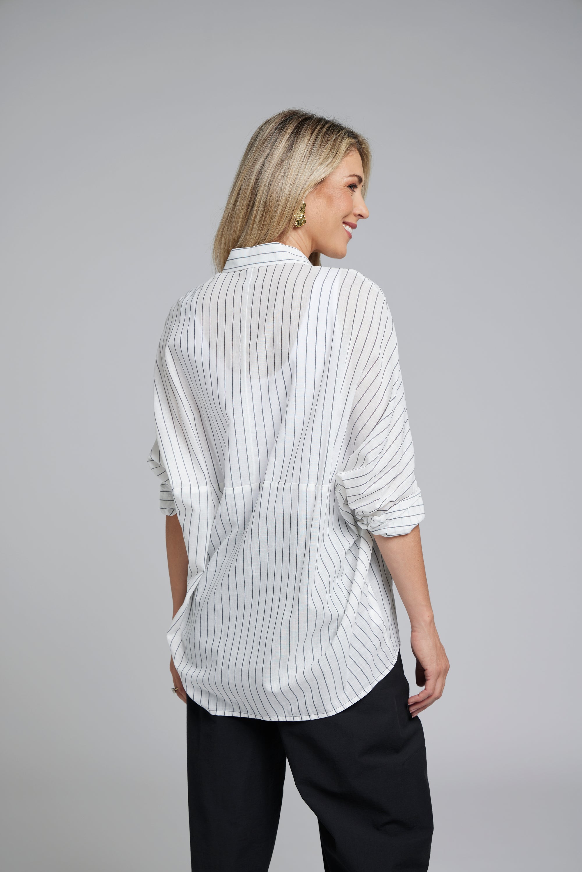The NES Zola Shirt – an oversized cotton stripe shirt with kimono shape and drop-back detail. Lightweight, modern and NZ made.