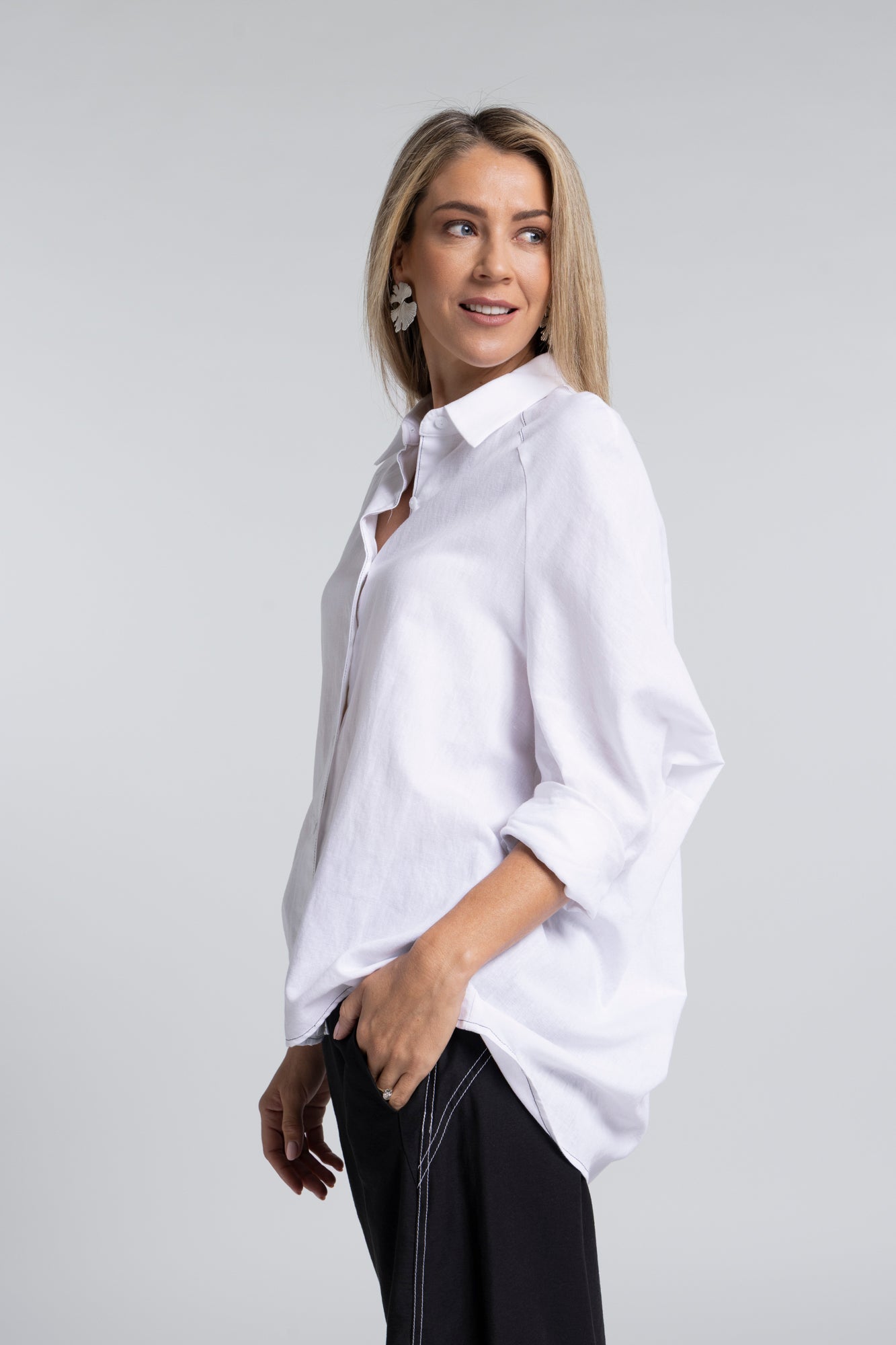 The NES Zola Linen Shirt – an oversized linen-cotton shirt with contrast stitching and drop-back detail. Lightweight and NZ made.