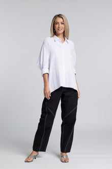 The NES Zola Linen Shirt – an oversized linen-cotton shirt with contrast stitching and drop-back detail. Lightweight and NZ made.