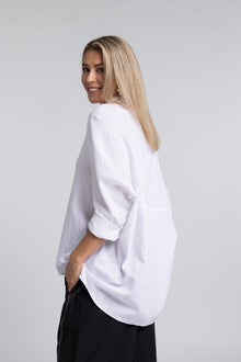 The NES Zola Linen Shirt – an oversized linen-cotton shirt with contrast stitching and drop-back detail. Lightweight and NZ made.