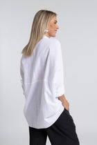 The NES Zola Linen Shirt – an oversized linen-cotton shirt with contrast stitching and drop-back detail. Lightweight and NZ made.
