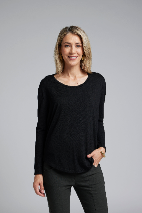 The NES Reya Top by N-E-S – a soft 100% merino long sleeve top with scoop neck, curved hem and bias cut sleeves. A winter essential. NZ made.