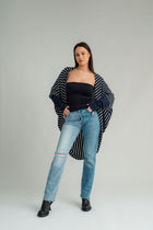 NES Voltage cardi is perfect for layering or a great trans-seasonal piece, Flattering batwing sleeve, Dress up or down, Can be worn multiple ways - by flipping the cardi upside down so the hem is worn around your neck. by doing this you will get either a shorter hip length cardi or a longer length cardi - falling mid thigh (at the back) 100% merino