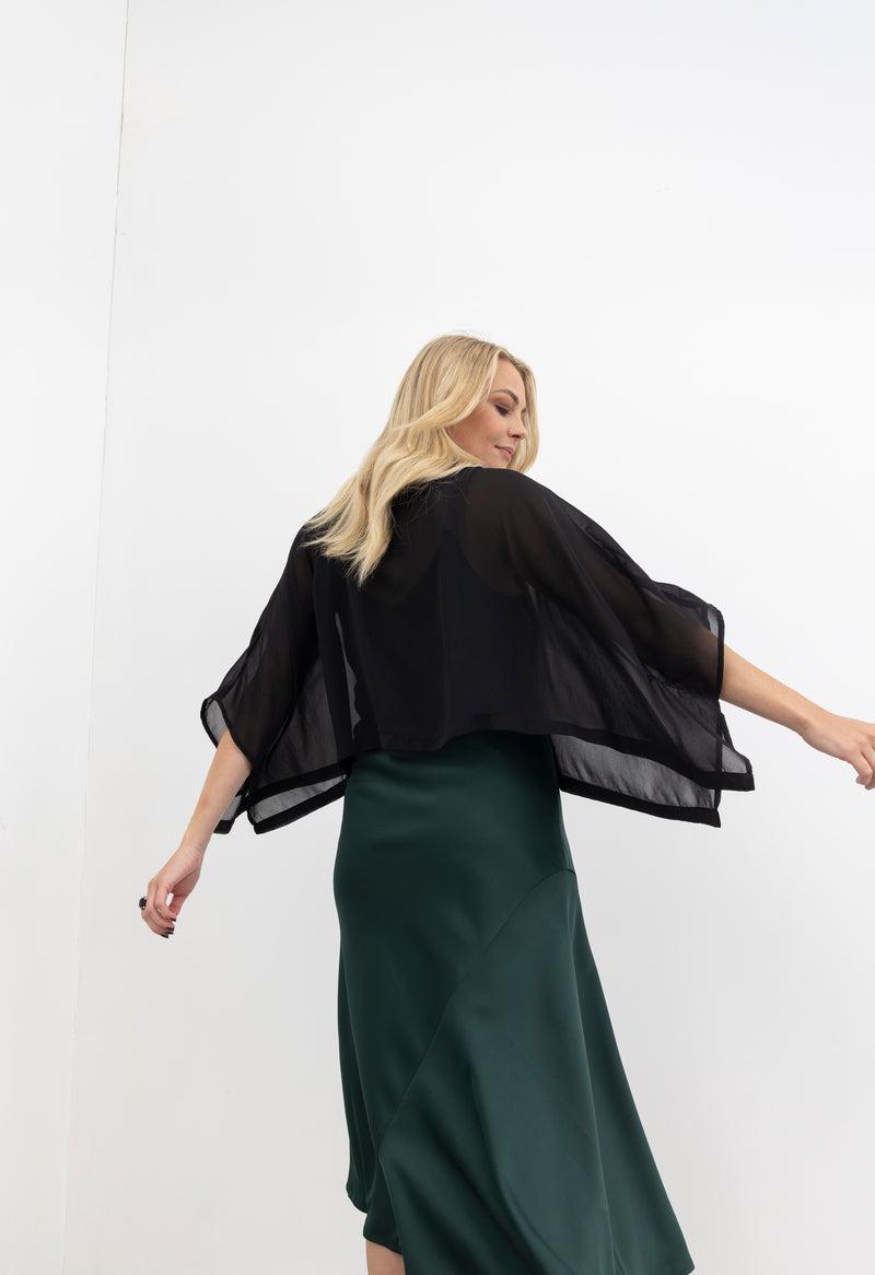 Elevate your wardrobe style with the NES Kio Top, a playful twist on our best-selling Bioko Top. Featuring a chic tube neck, stitched-in armholes, and a stylish high-low hem, Kio is the ultimate wardrobe must-have. Perfect for adding instant style and coverage, Kio layers effortlessly over any tank-style top or dress. Whether dressing up or down, the NES Kio Top combines versatility with fashion flair, making it a go-to piece for any occasion. A must-have addition to your collection for effortless sophistic