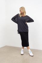 NES Step Mesh top, Charcoal. Our Step Mesh Top is soft and floaty. Easy wearing, made in a sheer mesh fabric, features side splits a hi-low hemline, wide neckline. Fitted raw edge sleeved.
Composition: Nylon Mesh