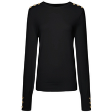 Nicki by Moke women’s fine gauge knit top in fresh 2026 tonal colours. Crafted from a soft 12 gauge yarn for a lightweight feel and smooth, polished drape, creating a flattering, best selling silhouette ideal for trans seasonal layering. Features statement gold button detailing at the sleeves and shoulders for a refined, elevated finish. An effortless everyday knit designed in New Zealand and loved season after season.