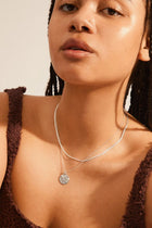 The Nomad 2-in1 coin necklace  from Pilgrim is a classic favourite for your jewellery collection.
Available in gold-plated &amp; silver-plated with two separate chains and 2-in-1 feature
Radiate urban vibes with trendy chain links and coin pendants
38 cm / 40 cm + 9 cm extension chain
Ultra-cool necklaces for nights out and everyday use
Style with a turtleneck and trainers for a cool look