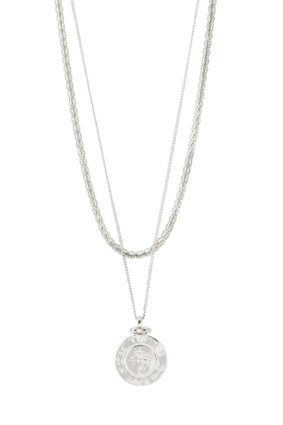 The Nomad 2-in1 coin necklace  from Pilgrim is a classic favourite for your jewellery collection.
Available in gold-plated &amp; silver-plated with two separate chains and 2-in-1 feature
Radiate urban vibes with trendy chain links and coin pendants
38 cm / 40 cm + 9 cm extension chain
Ultra-cool necklaces for nights out and everyday use
Style with a turtleneck and trainers for a cool look