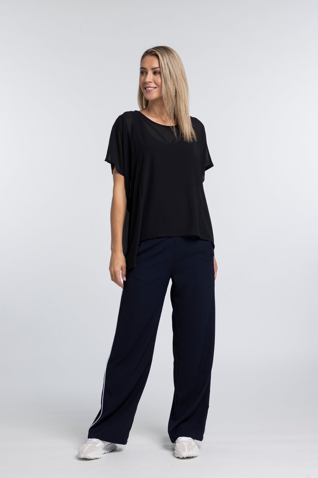 The NES Civita Top by N-E-S – a best-selling oversized chiffon top with split sides for versatile styling. Lightweight, effortless and NZ made.