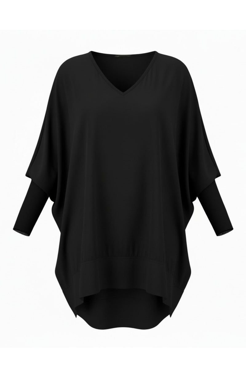 The NES Virtue Tunic by N-E-S – a floaty, relaxed tunic with a scoop neck, curved hem and effortless drape. Perfect layered over a Lattice Singlet. NZ made.