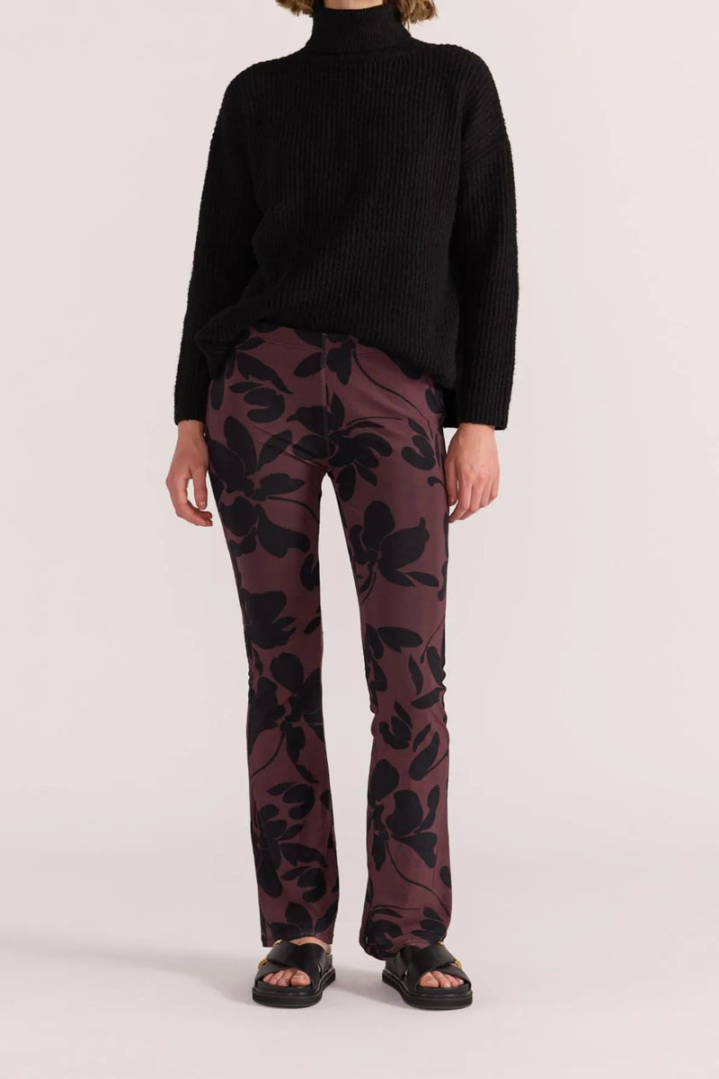 The Staple the Label Olina Mesh Pants feature the same moody floral print as the matching top, crafted in a sheer stretch mesh that moves with you. With a flattering flared leg and pull-on waistband, these pants bring serious 90s energy with a modern edge.
- Sheer mesh fabric with all-over black floral print
- Elastic waistband for comfort and ease
- Slim fit through the leg with a slight flare
